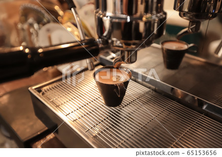 Espresso cup of hot coffee with Close-up of 65153656