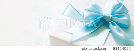 A gift for a boy. Surprise. Blue satin ribbon with bow. 65154033