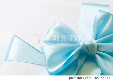 A gift for a boy. Blue satin ribbon with bow. A gift for a boy. Blue satin ribbon with bow. 65154035