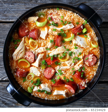Juicy southern chicken bog in a black dish Juicy southern chicken bog in a black dish 65154429