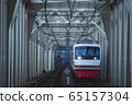 Train crossing an iron bridge 65157304