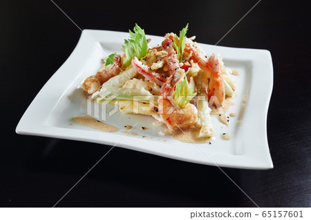 Fresh salad with shrimps and vegetables. Fresh salad with shrimps and vegetables. 65157601
