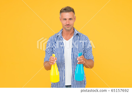 Cleaning made simple. Cleaning man yellow Cleaning made simple. Cleaning man yellow 65157692