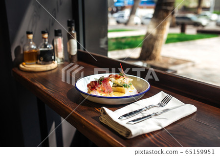 Morning bruschetta toasts with bacon vegetables 65159951