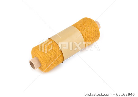 Color bobbin of yarn with label. Side view. Textile reel on isolated white background 65162946