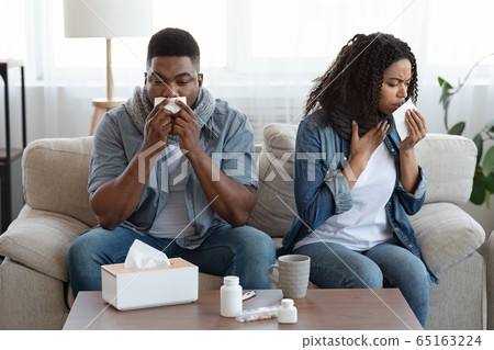 Coronavirus Disease. Sick Black Couple Suffering From Covid-19 Infection At Home 65163224
