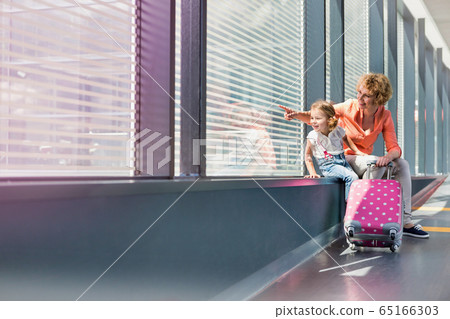 Portrait of mature woman with her cute little 65166303