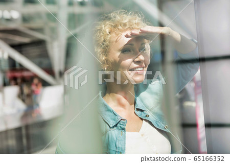 Portrait of mature woman covering her eyes from Portrait of mature woman covering her eyes from 65166352