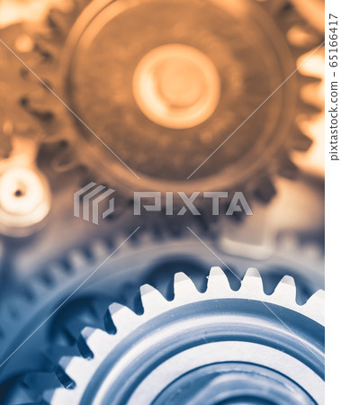 gears industrial background with warm shiny light gears industrial background with warm shiny light 65166417