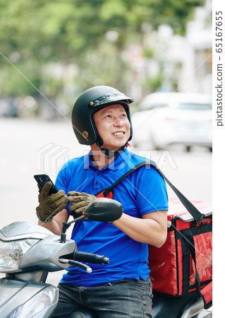 Courier checking address of client Courier checking address of client 65167655