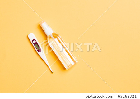 Top view of alcohol hand sanitizer and digital 65168321