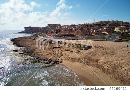 Empty beach of Torre La Mata 65169411