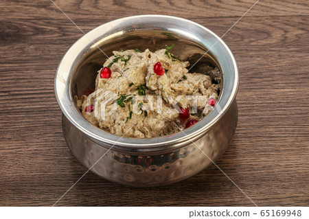 Vagan dietary cusine - mutabal with granet seeds 65169948
