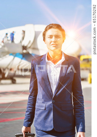 Portrait of young attractive flight attendant 65170292