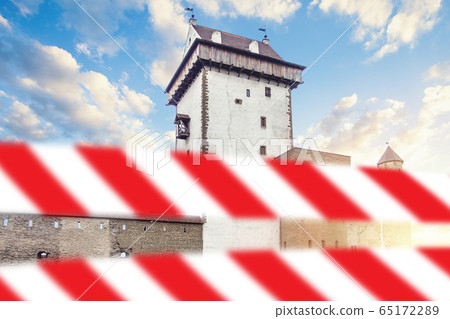 Narva, Estonia with warning tape. Narva, Estonia with warning tape. 65172289
