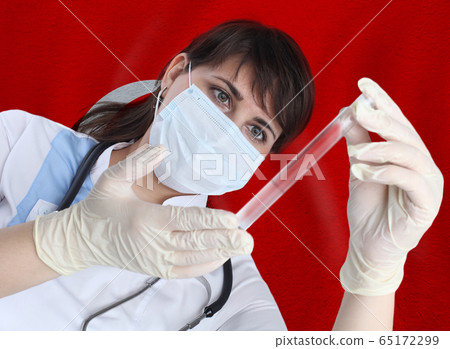 Scientist woman with test tube Coronavirus Scientist woman with test tube Coronavirus 65172299