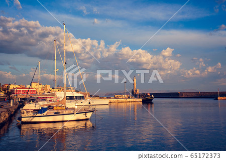 Yachts and boats in picturesque old port of Chania, Crete island. Greece Yachts and boats in picturesque old port of Chania, Crete island. Greece 65172373
