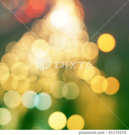 yellow christmas background with bokeh lights 65174379