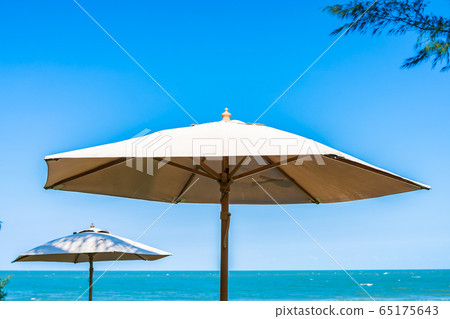 Umbrella and chair around beach sea ocean Umbrella and chair around beach sea ocean 65175643