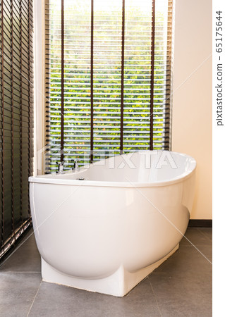 White bathtub and jacuzzi decoration interior White bathtub and jacuzzi decoration interior 65175644