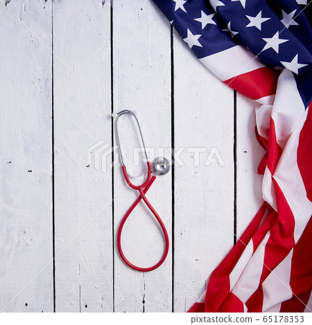 American Flag With Stethoscope On Table American Flag With Stethoscope On Table 65178353