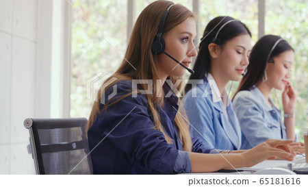 Customer support agent or call center with headset 65181616