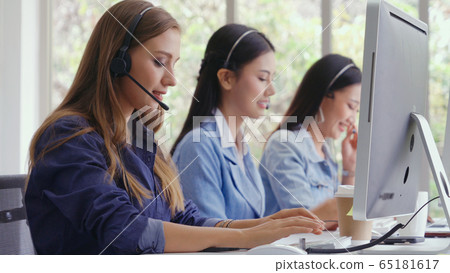 Customer support agent or call center with headset Customer support agent or call center with headset 65181617