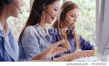 Customer support agent or call center with headset 65181618