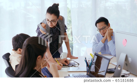 Unhappy business people in group meeting. 65181686