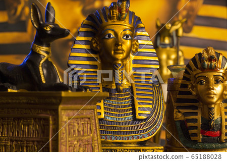 Statues of tutankhamun and mythology jackal anup 65188028