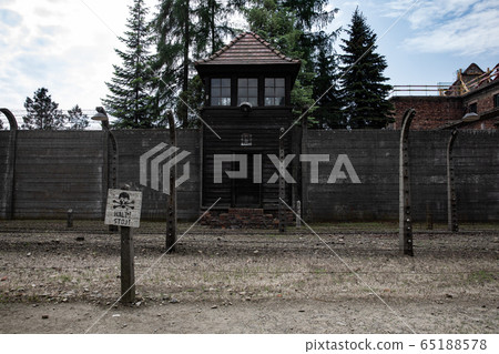 Stop sign with skull in Auschwitz, nazi concentration camp of Poland 65188578