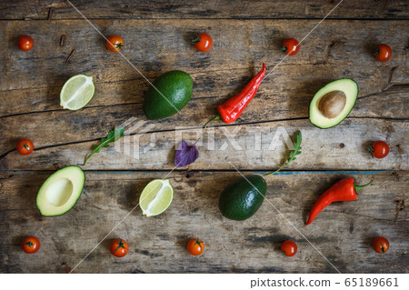 Guacamole ingredients flat lay on the wooden table 65189661