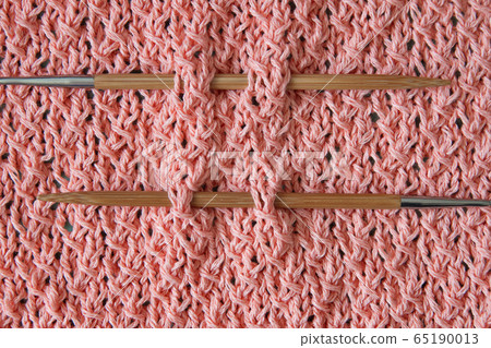 Coral cotton cardigan, crocheted close-up, wooden bamboo natural knitting needles 65190013