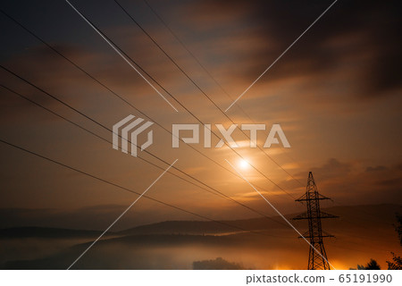 Power line at sunset. Electricity 65191990