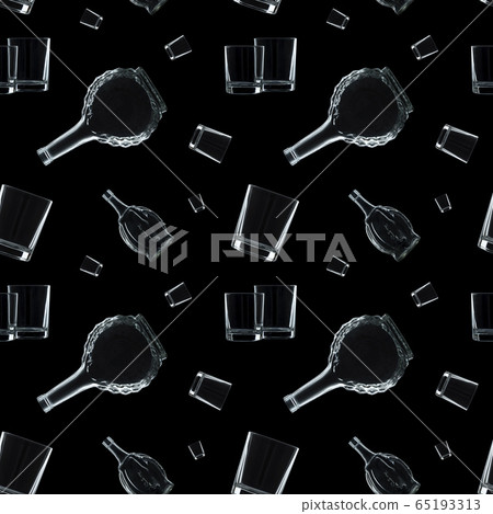 Bottles and glasses on a black background. Bottles and glasses on a black background. 65193313