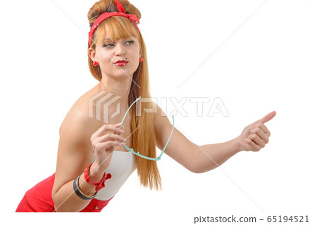 sexy pin up  girl hitchhiking with sun glasses 65194521