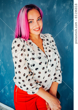 beautiful girl with pink hair posing at photoshoot 65196818