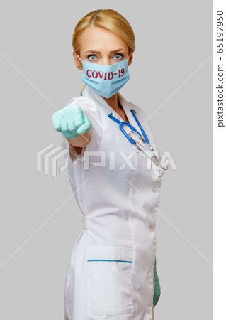 medical doctor nurse woman with stethoscope wearing protective mask 65197950