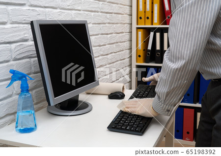 concept of cleaning or disinfecting the office - a 65198392