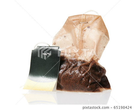 one used tea bag, macro photo high detailed, 65198424