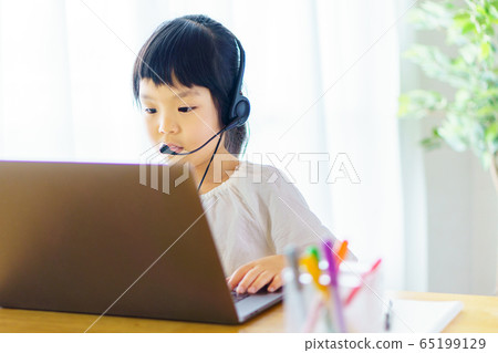 Girl learning at home online 65199129