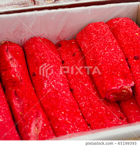 Assorted Turkish Delight. Traditional eastern sweets on market. Turkish colorful desserts Lokum. Assorted Turkish Delight. Traditional eastern sweets on market. Turkish colorful desserts Lokum. 65199393