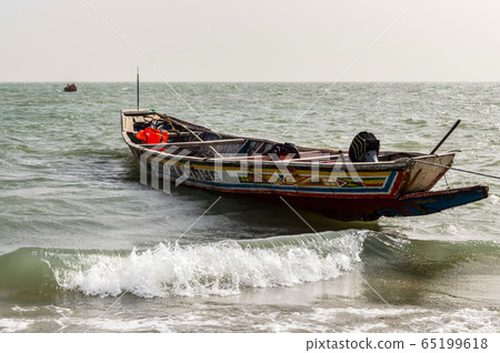 Colorful fishing boat in Banjul, 65199618