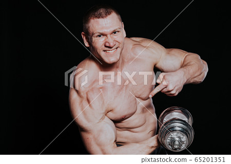 Sport the athlete bodybuilder build muscles dumbbells 65201351