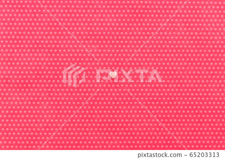 A plush fuchsia background in white polka dots A plush fuchsia background in white polka dots 65203313