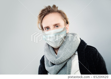 Man in protective mask on white background 65204420