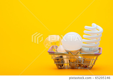 In the grocery basket are different types of light 65205146