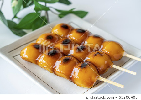 Mitarashi Dango Japanese confectionery white background Mitarashi Dango Japanese confectionery white background 65206403