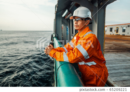 Filipino deck Officer on deck of vessel or ship 65209221