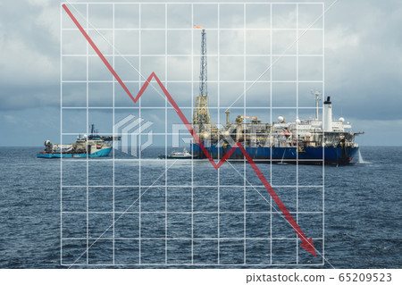 Concept of falling market in oil marine industry with with downward graphics. Oil price decreases. FPSO tanker with supply diving vessel on oilfield 65209523